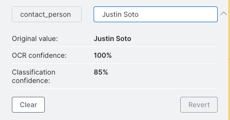 The information displayed by clicking a predicted value including the original value, OCR confidence, and classification confidence.