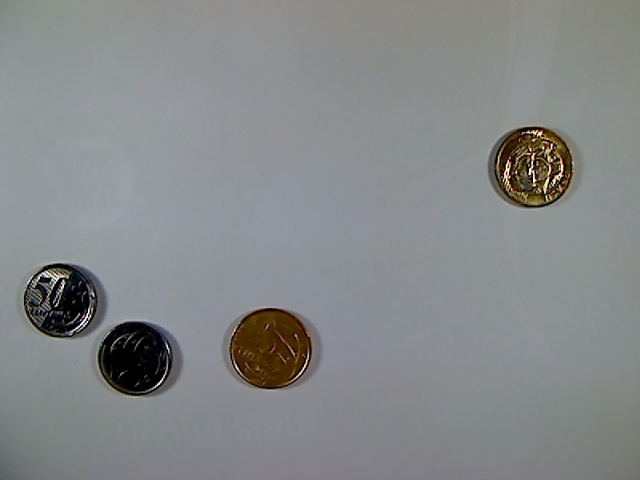 Four Brazilian Real coins from image label 150_1479430338.jpg
